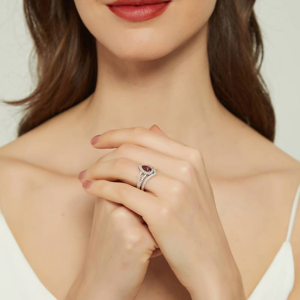 Model wearing Halo Wishbone Red Pear CZ Split Shank Ring Set in Sterling Silver, 6 of 16