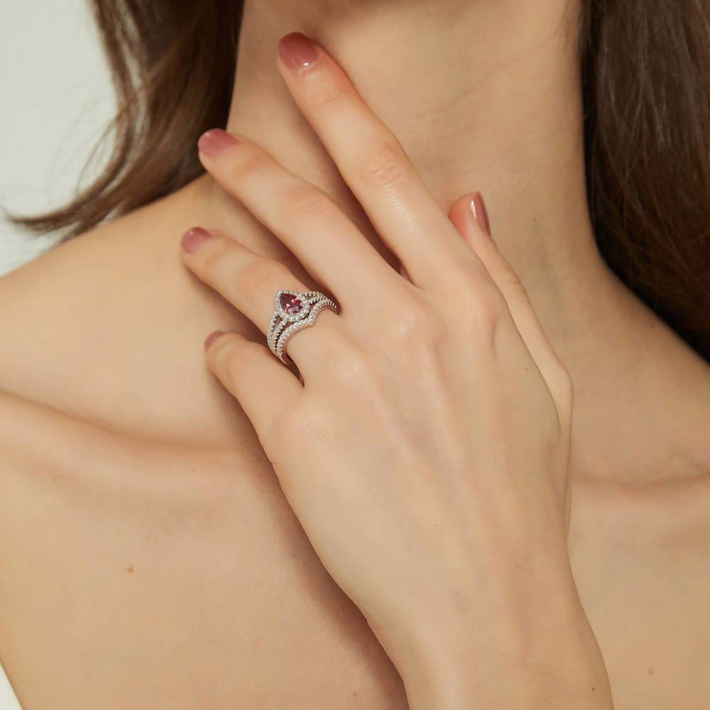 Model wearing Halo Wishbone Red Pear CZ Split Shank Ring Set in Sterling Silver, 3 of 16