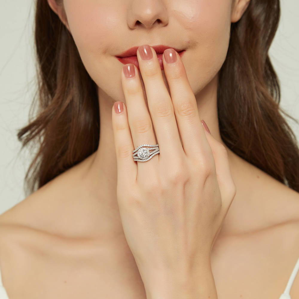 Model wearing Halo Wishbone CZ Split Shank Ring Set in Sterling Silver, 2 of 19