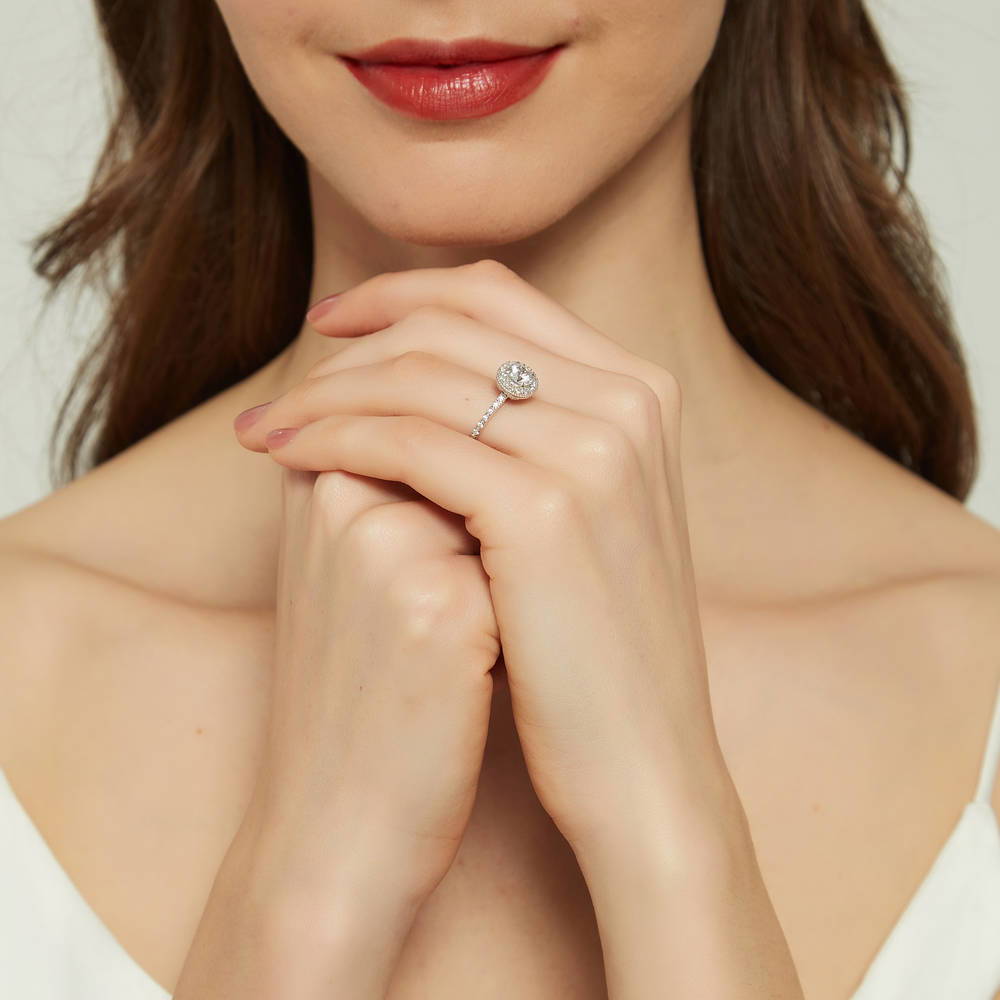 Model wearing Halo Round CZ Ring in Sterling Silver, 6 of 9