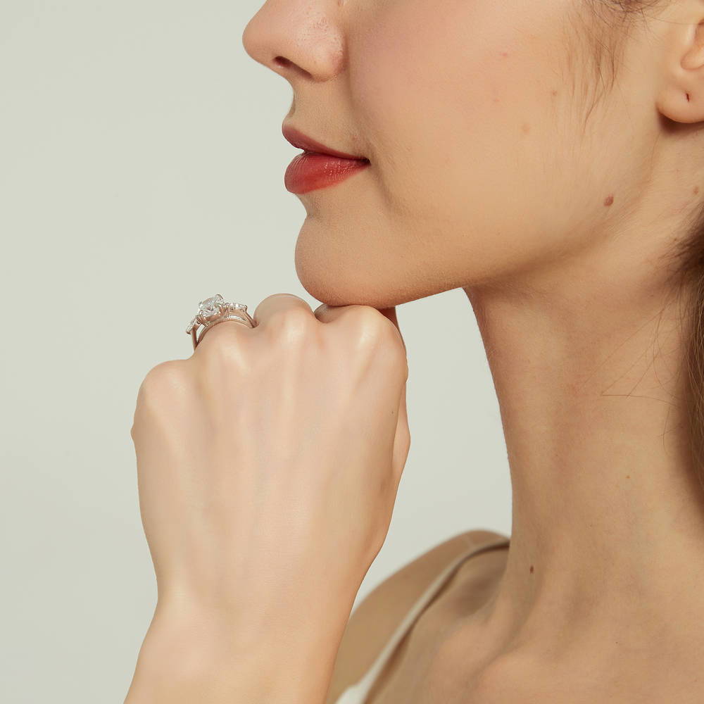 Model wearing 3-Stone 2.5ct Oval CZ Ring in Sterling Silver, 7 of 9