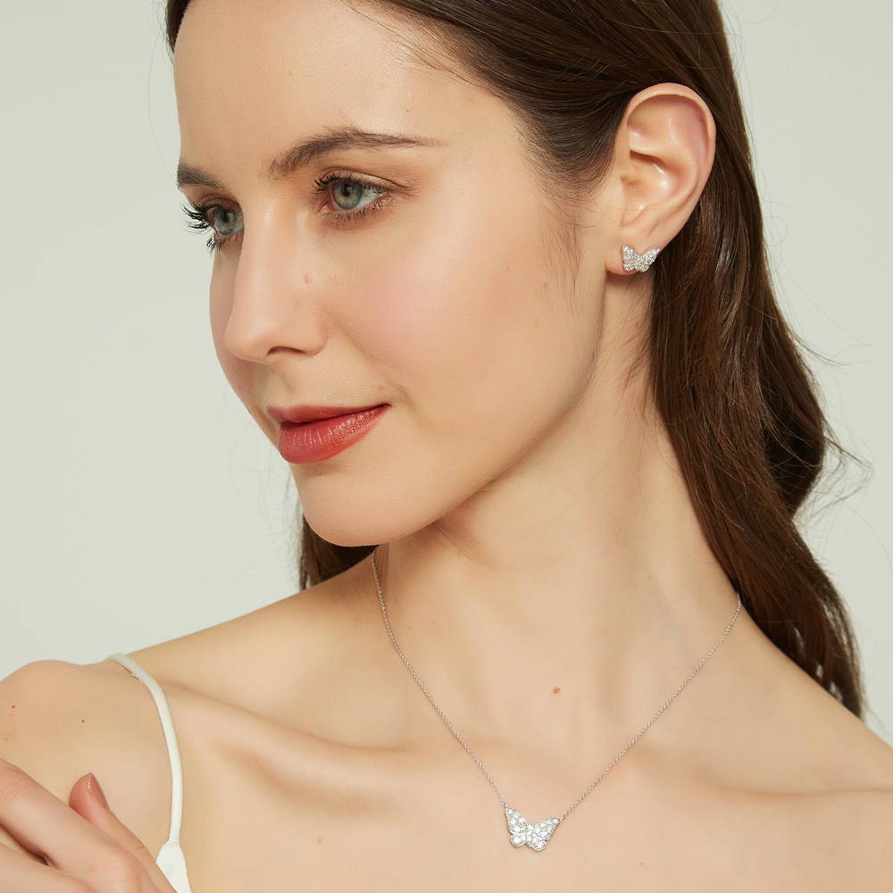 Model wearing Butterfly CZ Pendant Necklace in Sterling Silver, 3 of 7