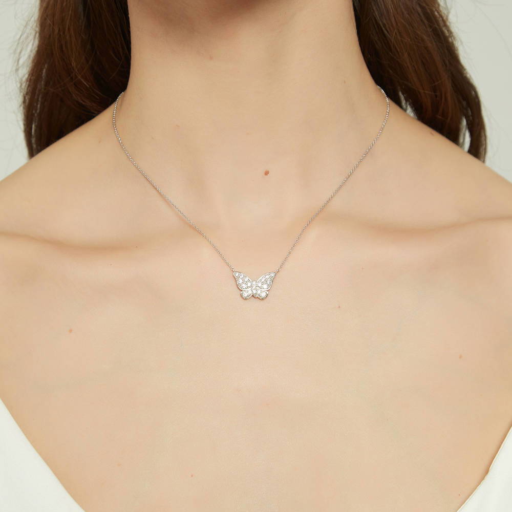 Model wearing Butterfly CZ Necklace in Sterling Silver, 2 of 7
