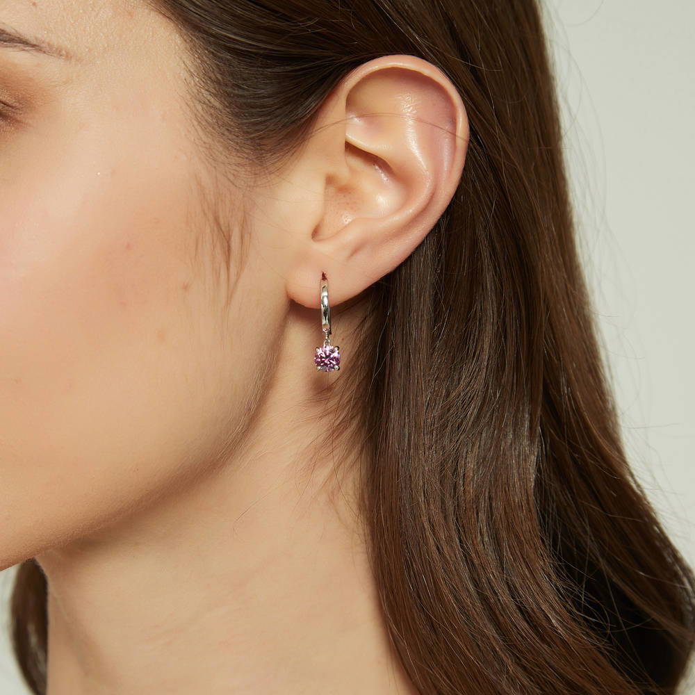 Model wearing Solitaire Round CZ Dangle Earrings in Sterling Silver 1.6ct, 8 of 10