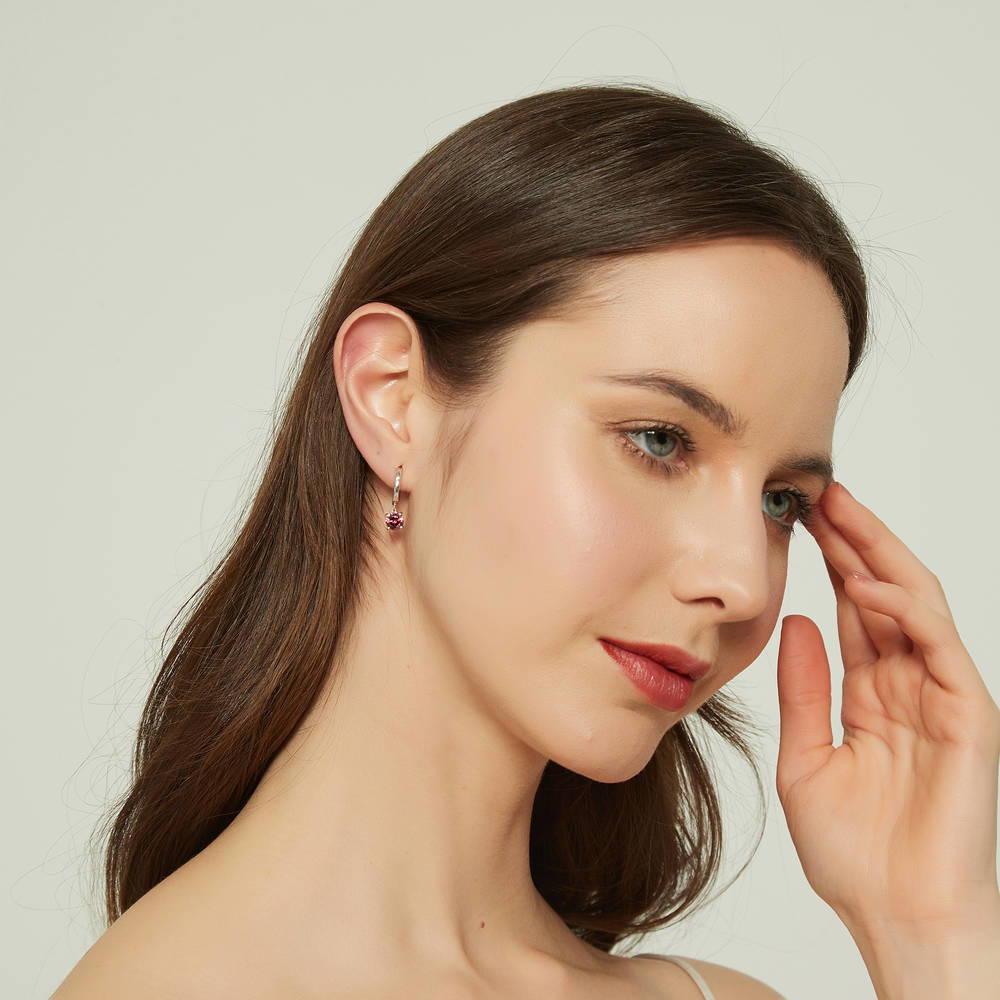 Model wearing Solitaire Round CZ Dangle Earrings in Sterling Silver 1.6ct, 7 of 10