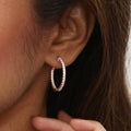 Model wearing CZ Small Inside-Out Hoop Earrings in Sterling Silver 1 inch, Rose Gold Flashed