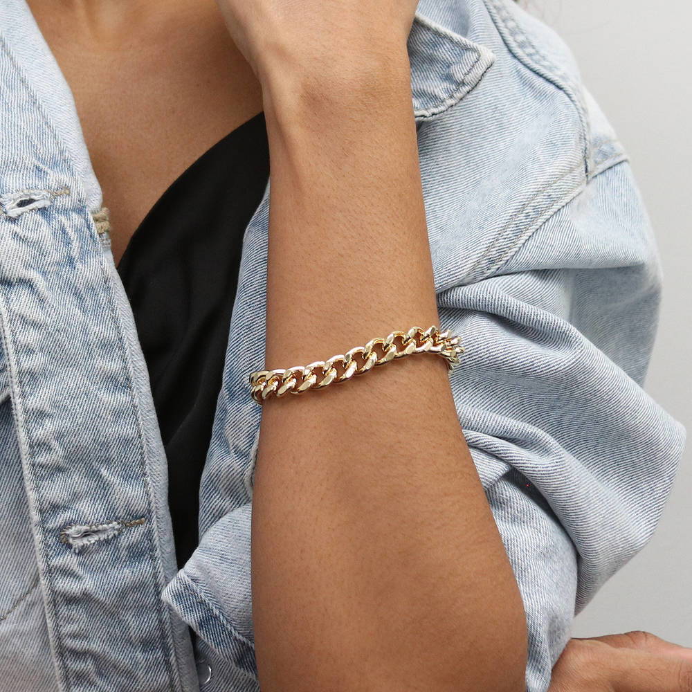 Model wearing Statement Lightweight Curb Chain Bracelet in Gold-Tone 9mm, 3 of 5