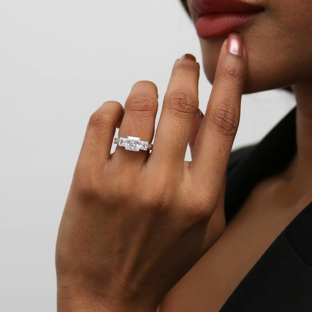 Model wearing 3-Stone Princess CZ Ring in Sterling Silver, 12 of 17