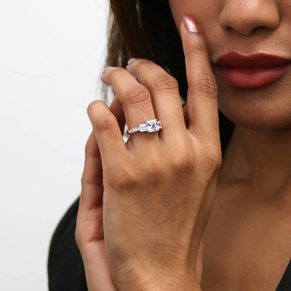 Model wearing 3-Stone Princess CZ Ring in Sterling Silver, 8 of 17