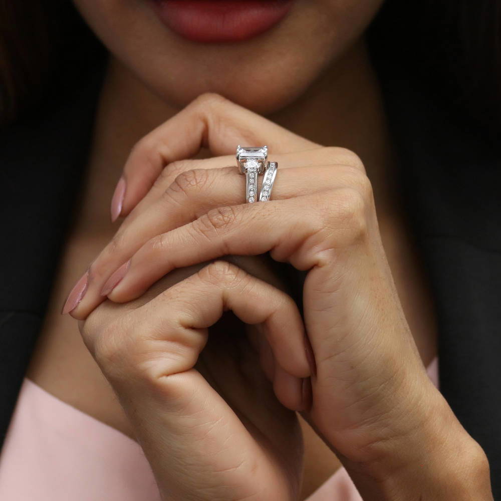Model wearing 3-Stone 2.1ct Emerald Cut CZ Ring Set in Sterling Silver, 9 of 19