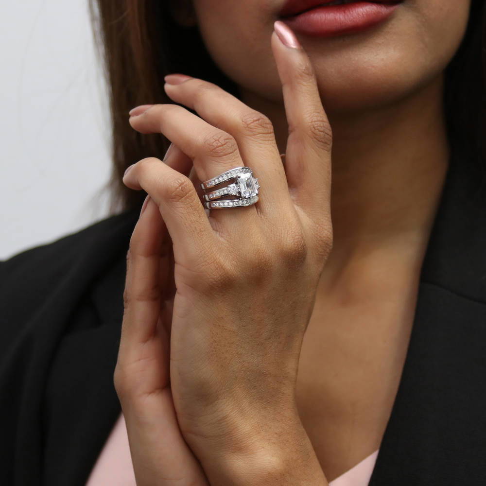Model wearing 3-Stone 2.1ct Emerald Cut CZ Ring Set in Sterling Silver, 3 of 19