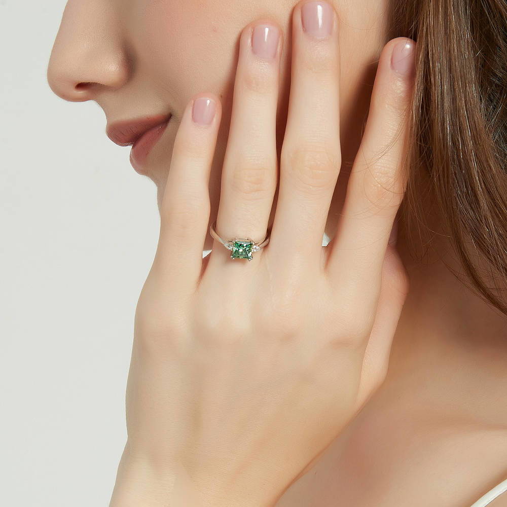 Model wearing 3-Stone 1.2ct Green Princess CZ Ring in Sterling Silver, 2 of 9