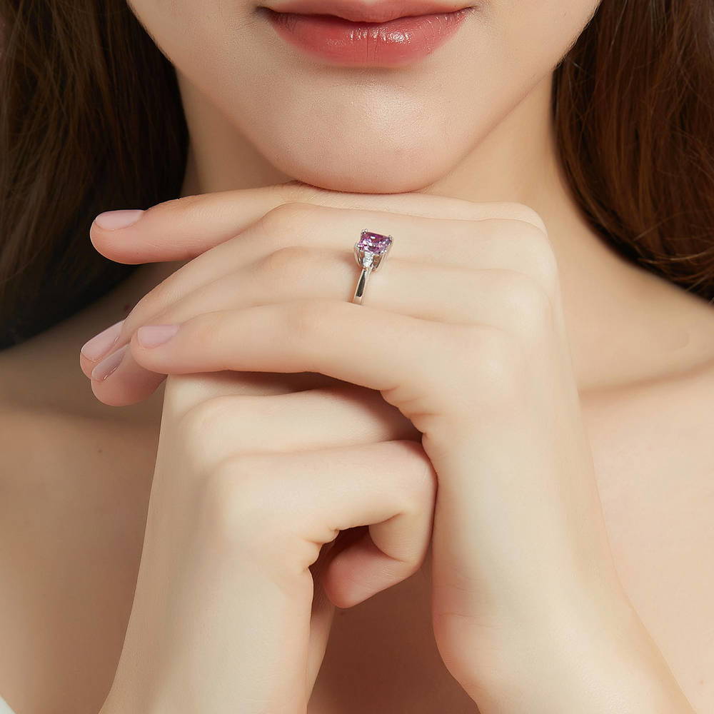 Model wearing 3-Stone Purple Princess CZ Ring in Sterling Silver, 6 of 9