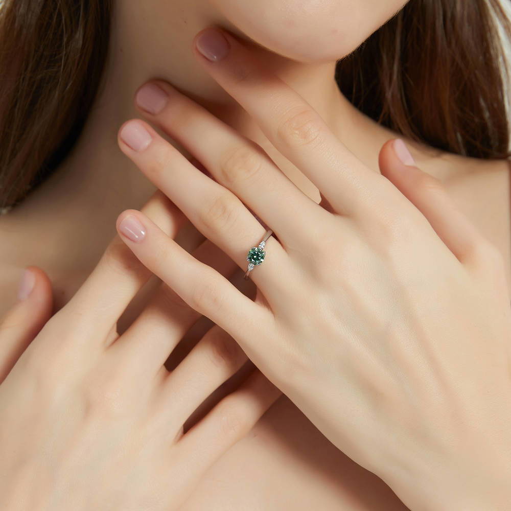 Model wearing 3-Stone Green Round CZ Ring in Sterling Silver, 2 of 9