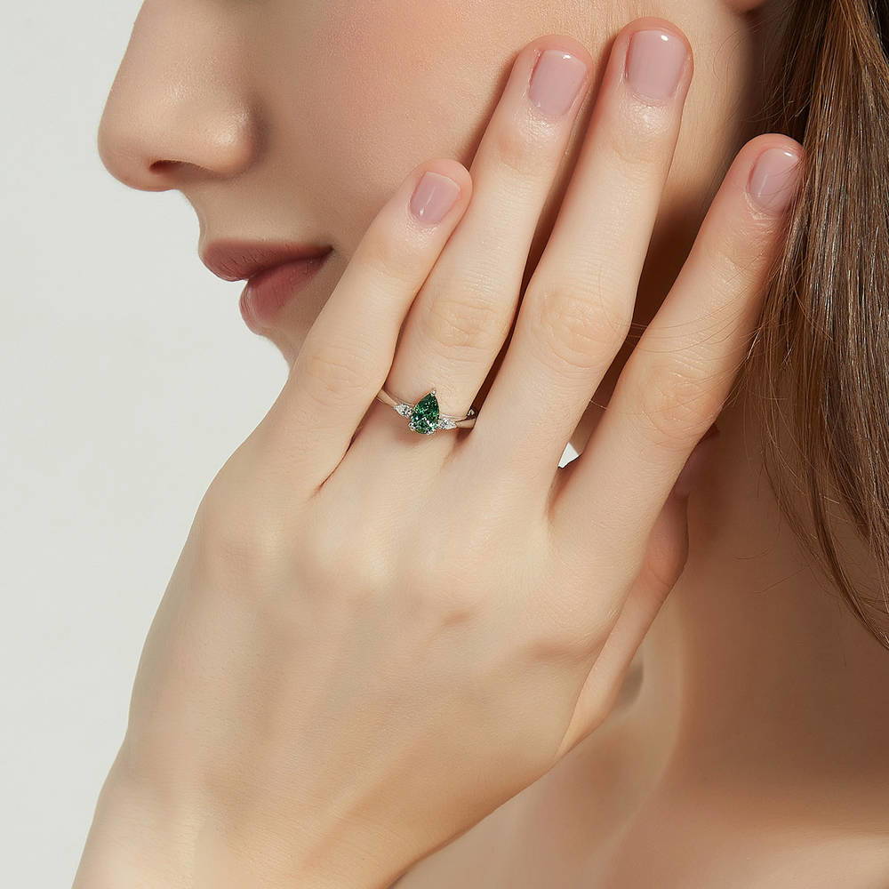 Model wearing 3-Stone 0.8ct Green Pear CZ Ring in Sterling Silver, 2 of 9