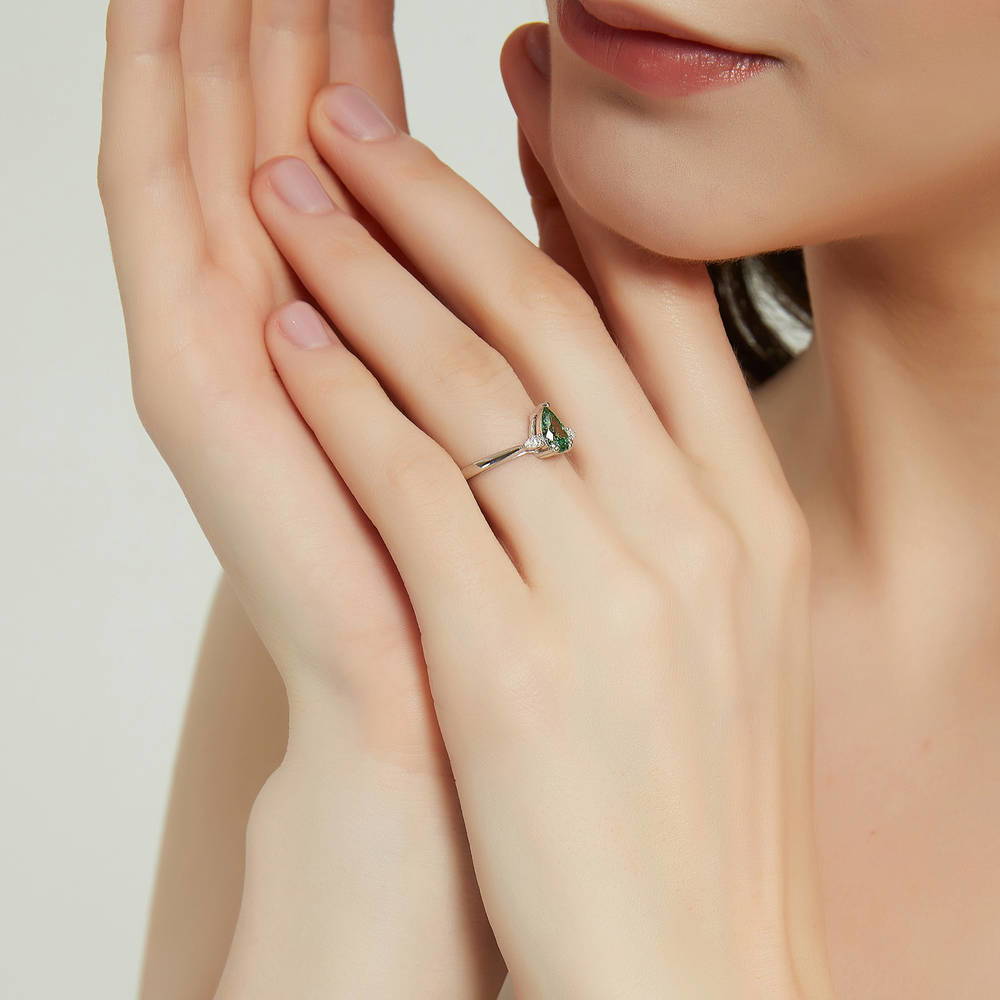 Model wearing 3-Stone 0.8ct Green Pear CZ Ring in Sterling Silver, 3 of 9