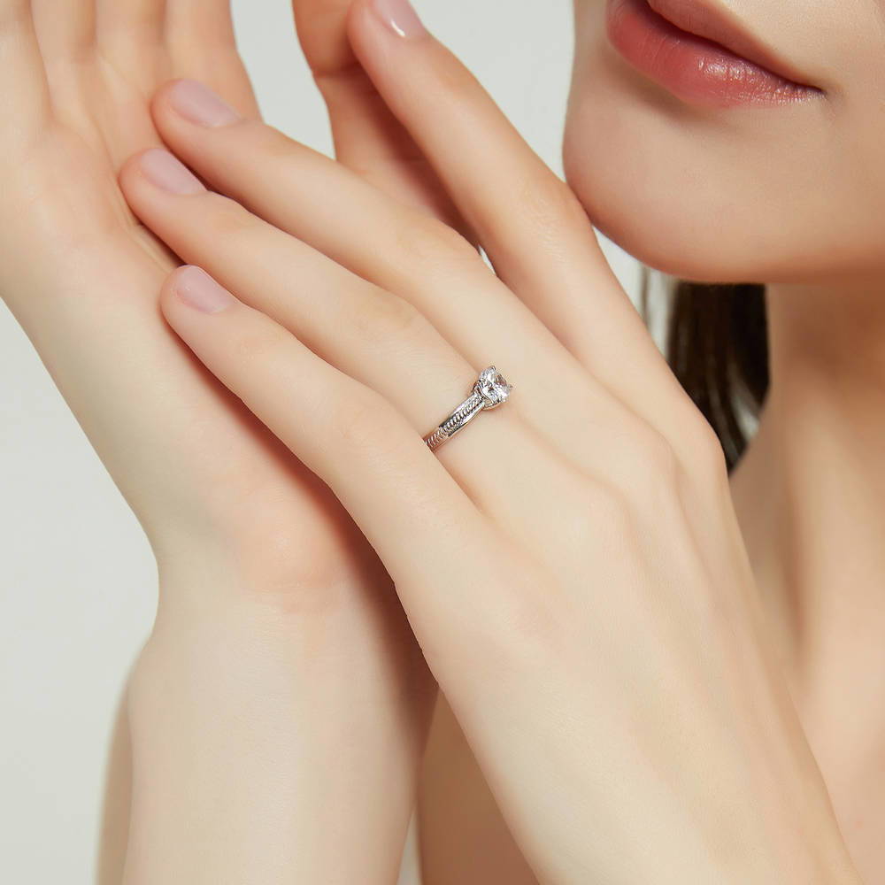 Model wearing Solitaire Cable 0.8ct Round CZ Ring in Sterling Silver, 3 of 9