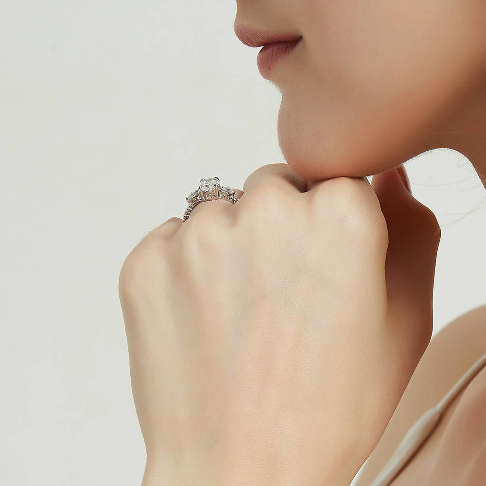 Model wearing 3-Stone Cable Oval CZ Ring in Sterling Silver, 7 of 10