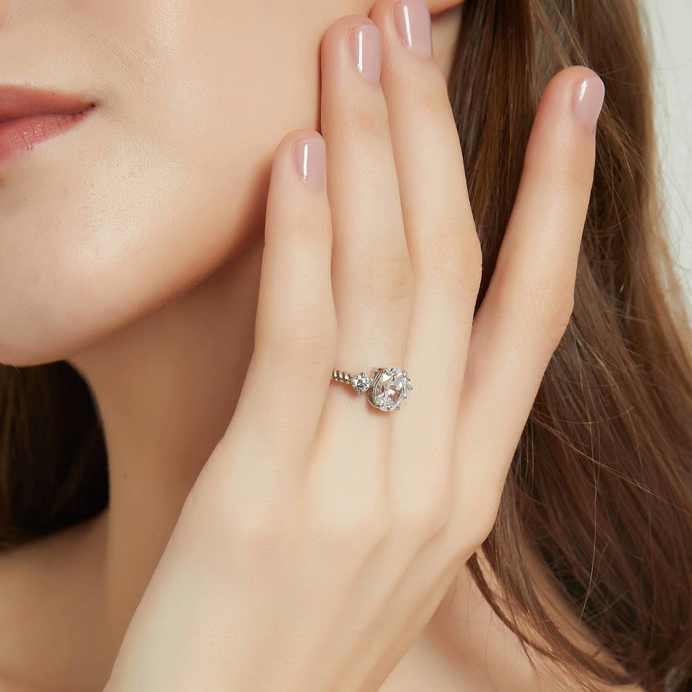 Model wearing 3-Stone Cable Oval CZ Ring in Sterling Silver, 3 of 10