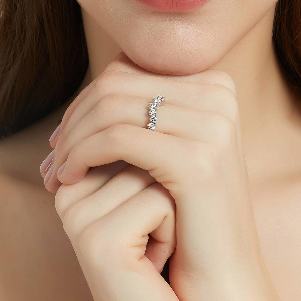 Model wearing 7-Stone Wishbone CZ Curved Half Eternity Ring in Sterling Silver, 6 of 9