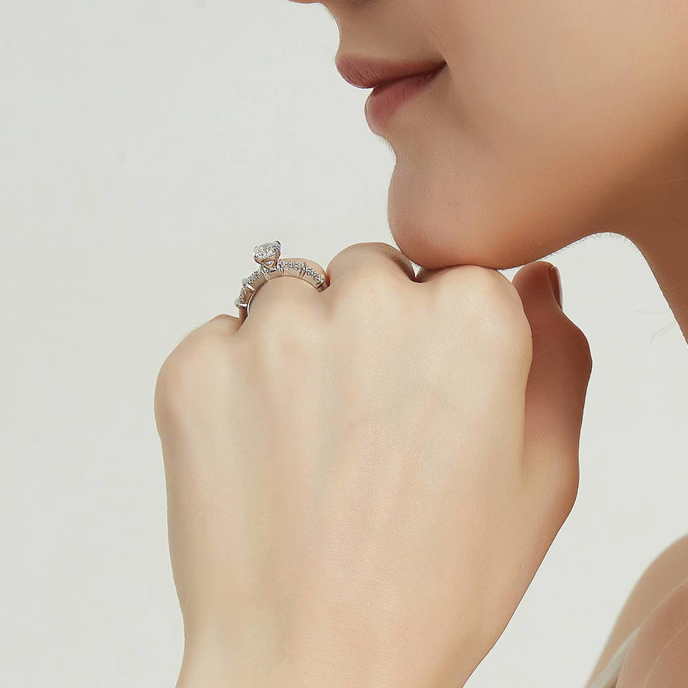 Model wearing Solitaire 1ct Round CZ Ring in Sterling Silver, 7 of 9