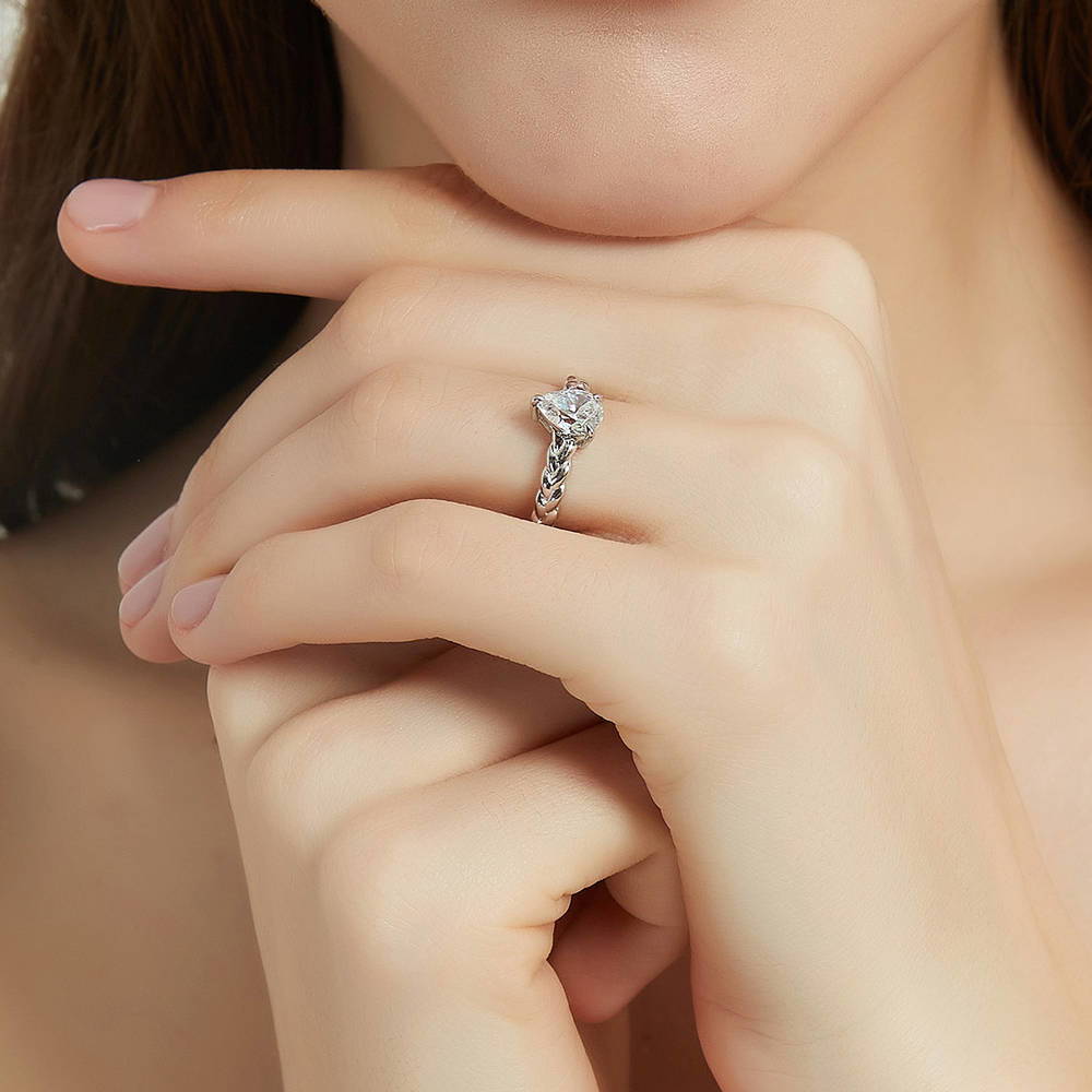 Model wearing Woven Solitaire CZ Ring in Sterling Silver