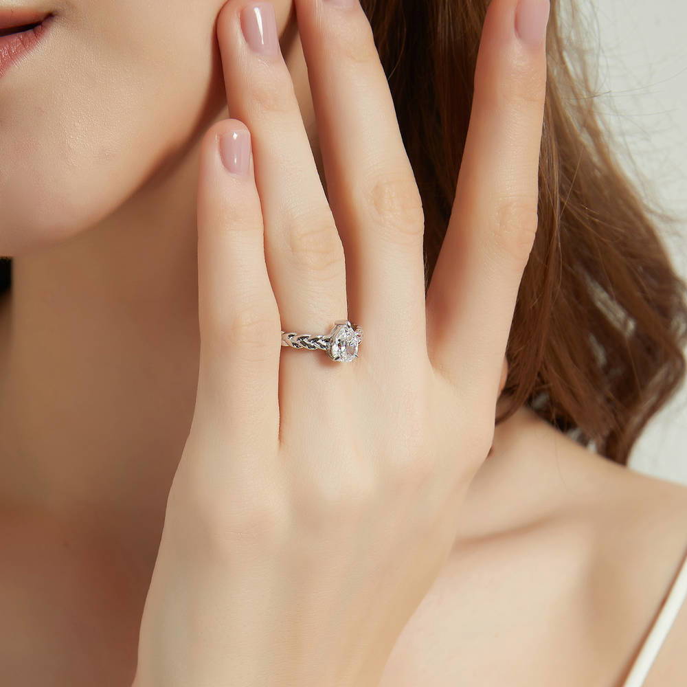 Model wearing Solitaire Woven 1ct Pear CZ Ring Set in Sterling Silver, 3 of 13