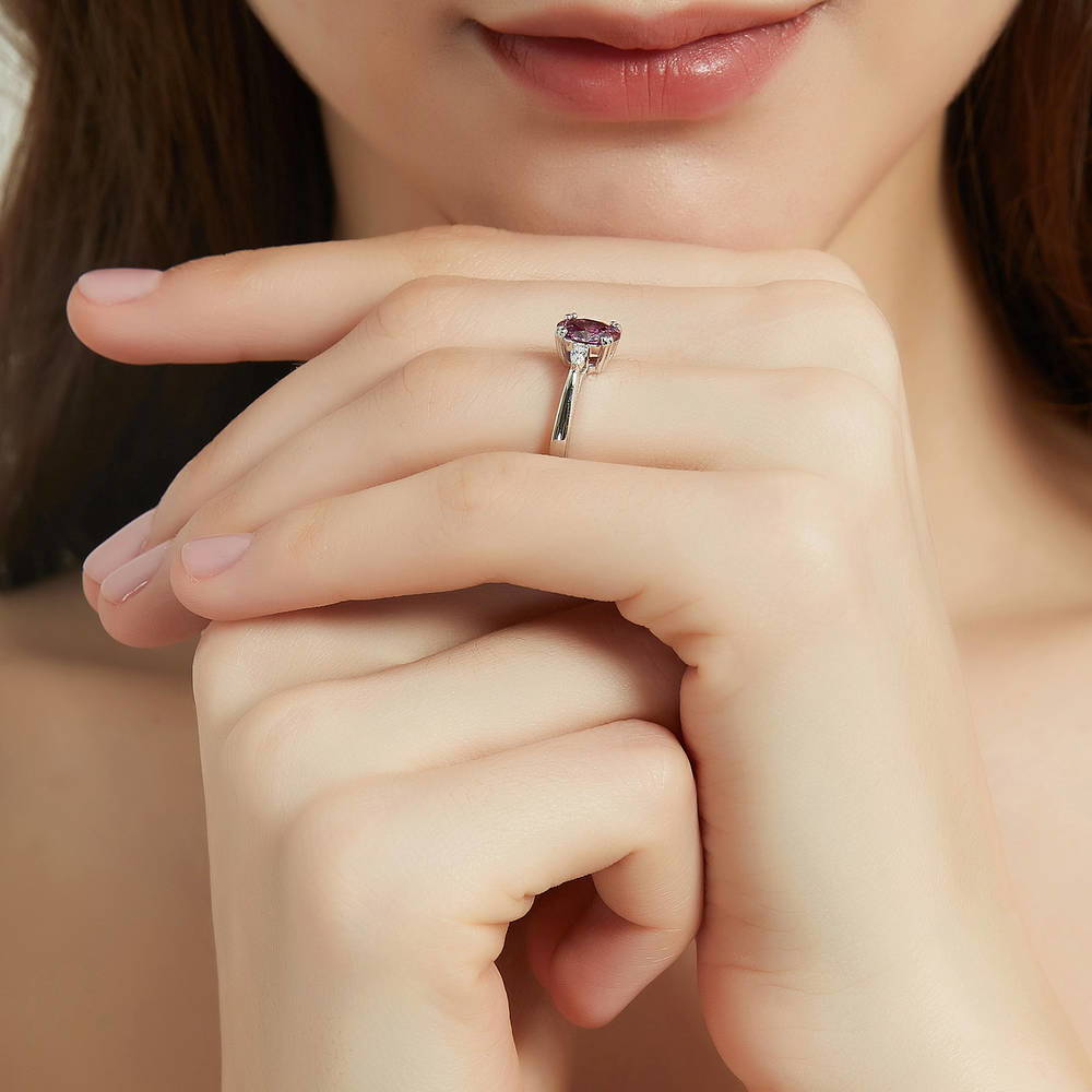 Model wearing 3-Stone 1.2ct Purple Oval CZ Ring in Sterling Silver, 6 of 9