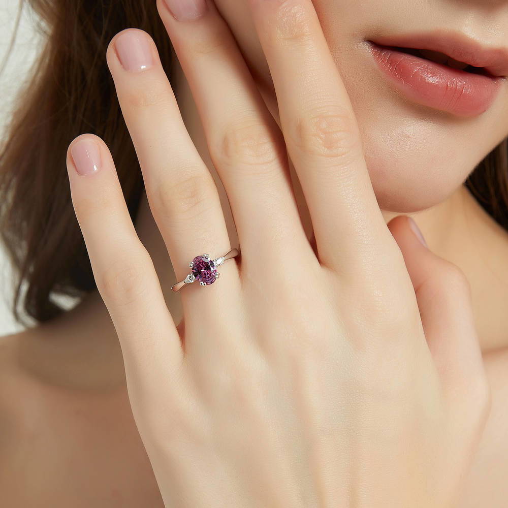 Model wearing 3-Stone 1.2ct Purple Oval CZ Ring in Sterling Silver, 2 of 9