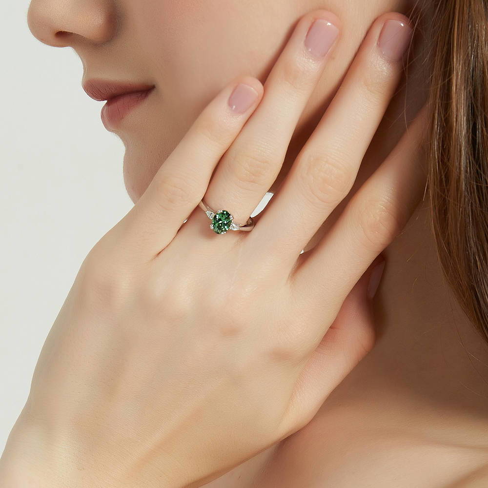 Model wearing 3-Stone 1.2ct Green Oval CZ Ring in Sterling Silver, 6 of 9