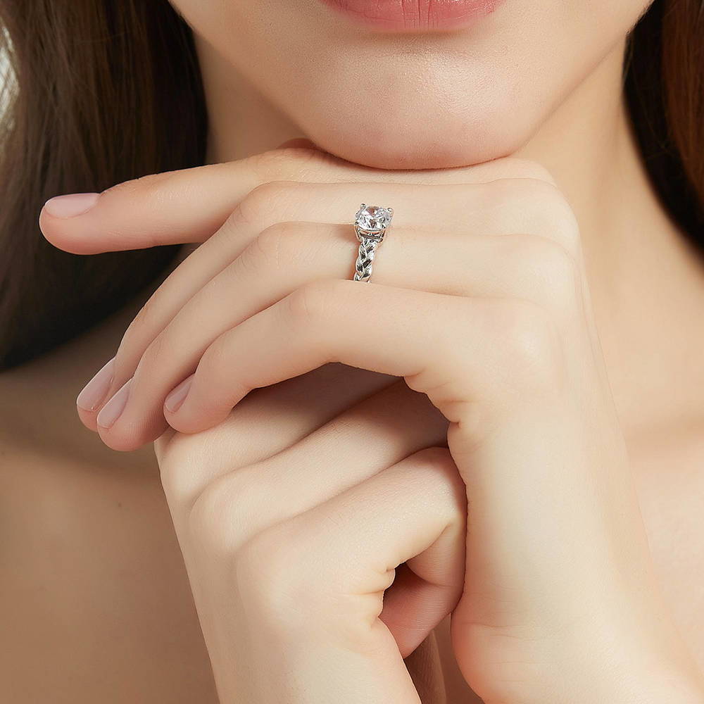Model wearing Solitaire Woven 1.25ct Round CZ Ring Set in Sterling Silver, 11 of 17
