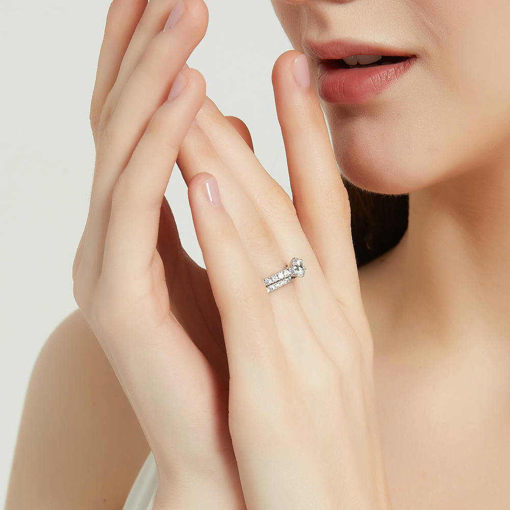 Model wearing Solitaire 0.8ct Round CZ Ring Set in Sterling Silver, 5 of 14