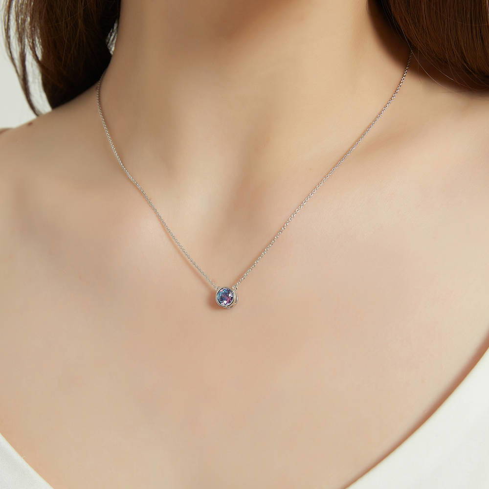 Model wearing Solitaire Bezel Set Round CZ Pendant Necklace in Sterling Silver 0.8ct, 3 of 16