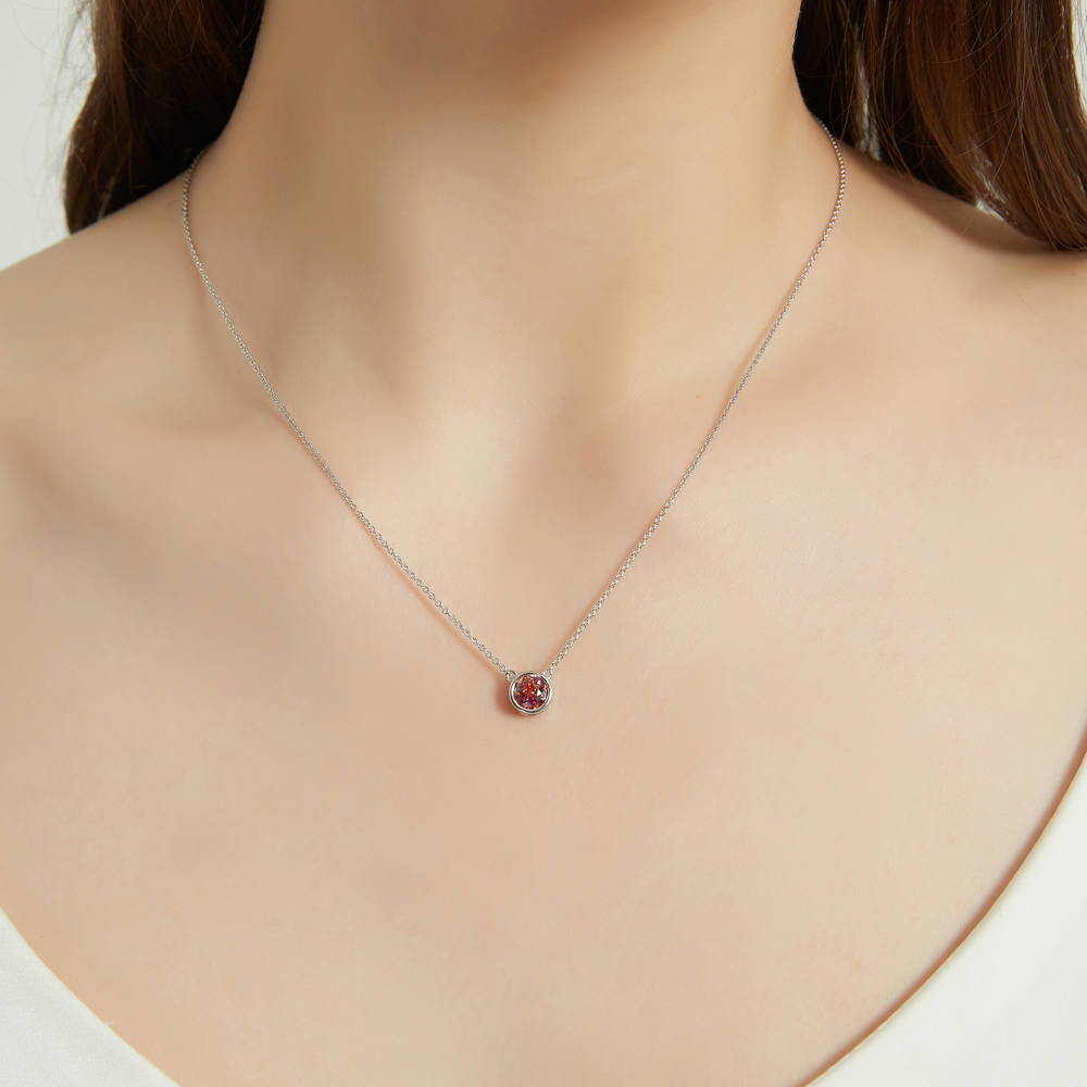 Model wearing Solitaire Bezel Set Round CZ Pendant Necklace in Sterling Silver 0.8ct, 7 of 16