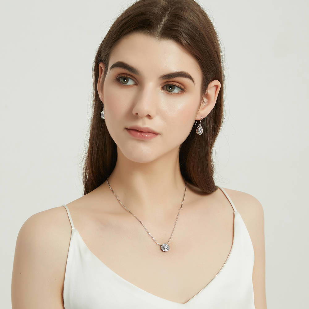 Model wearing Woven Solitaire Bezel Set CZ Pendant Necklace in Sterling Silver, 5 of 7