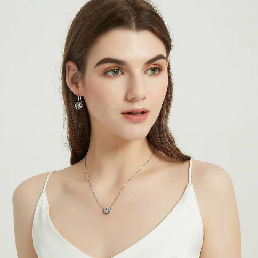 Model wearing Woven Solitaire Bezel Set CZ Pendant Necklace in Sterling Silver, 3 of 7