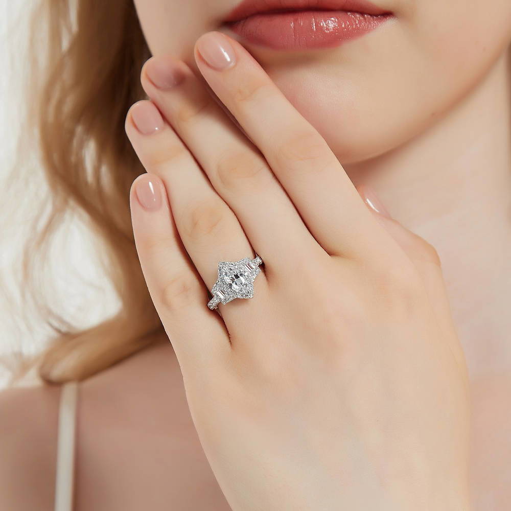Model wearing 3-Stone Halo Marquise CZ Ring in Sterling Silver, 2 of 11