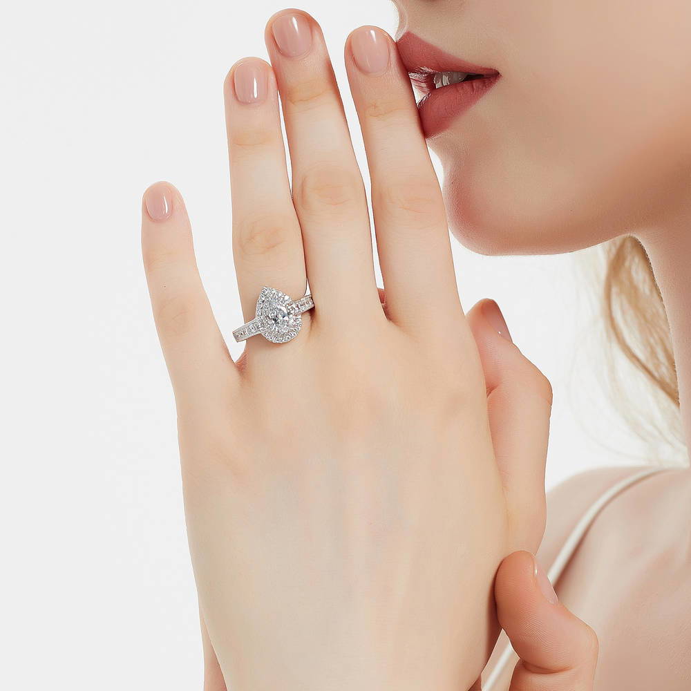 Model wearing Halo Milgrain Pear CZ Ring in Sterling Silver, 2 of 9