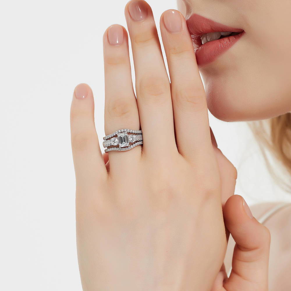 Model wearing 3-Stone 1ct Emerald Cut CZ Ring in Sterling Silver, 13 of 17