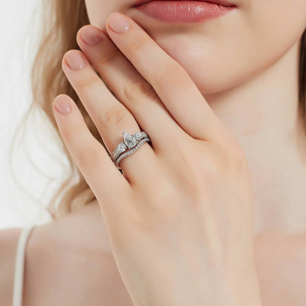 Model wearing 3-Stone 0.8ct Pear CZ Ring in Sterling Silver, 10 of 17