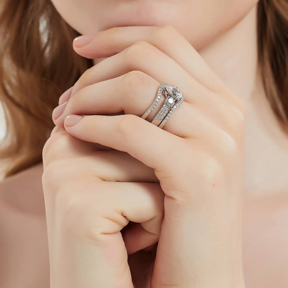 Model wearing 3-Stone 0.8ct Pear CZ Ring in Sterling Silver, 15 of 17