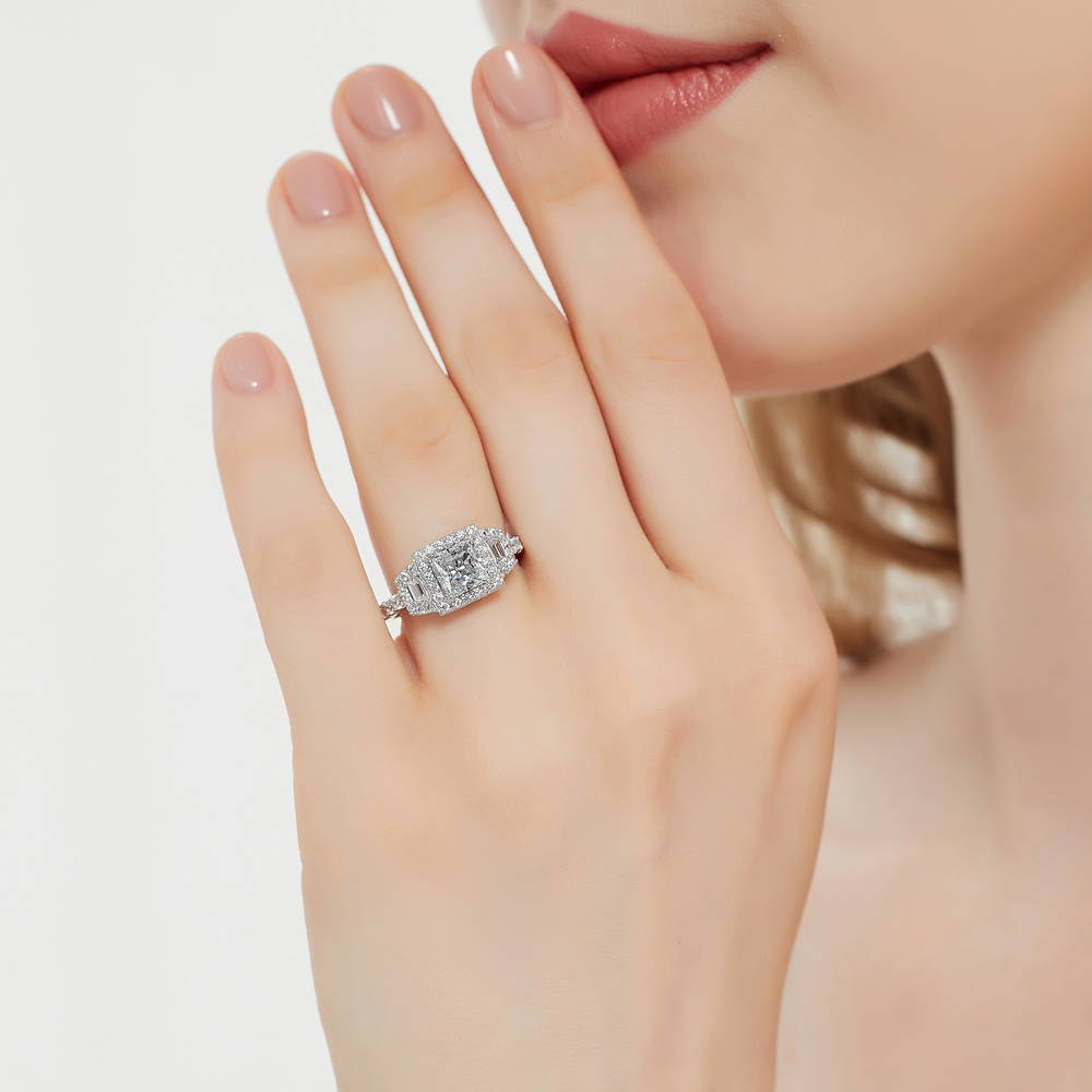 Model wearing Halo 3-Stone 1.2ct Princess CZ Ring in Sterling Silver, 3 of 11