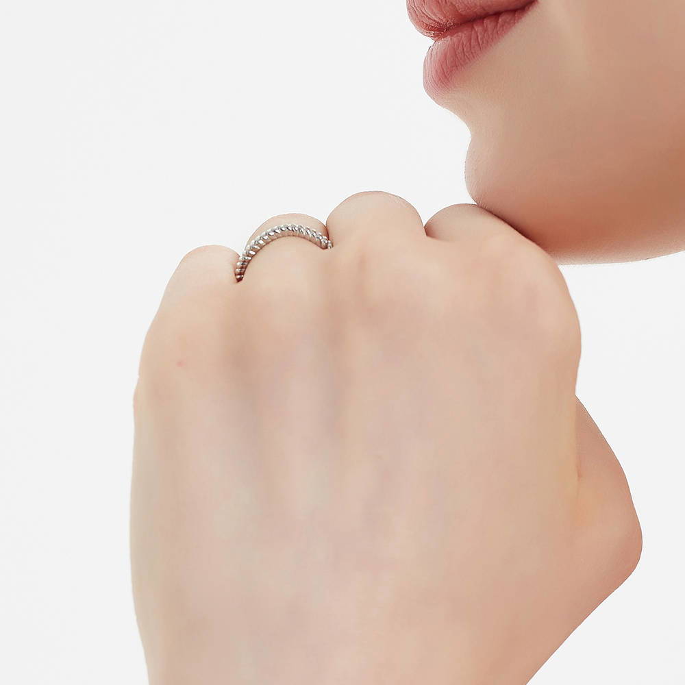 Model wearing 3-Stone Woven Round CZ Ring Set in Sterling Silver, 16 of 17