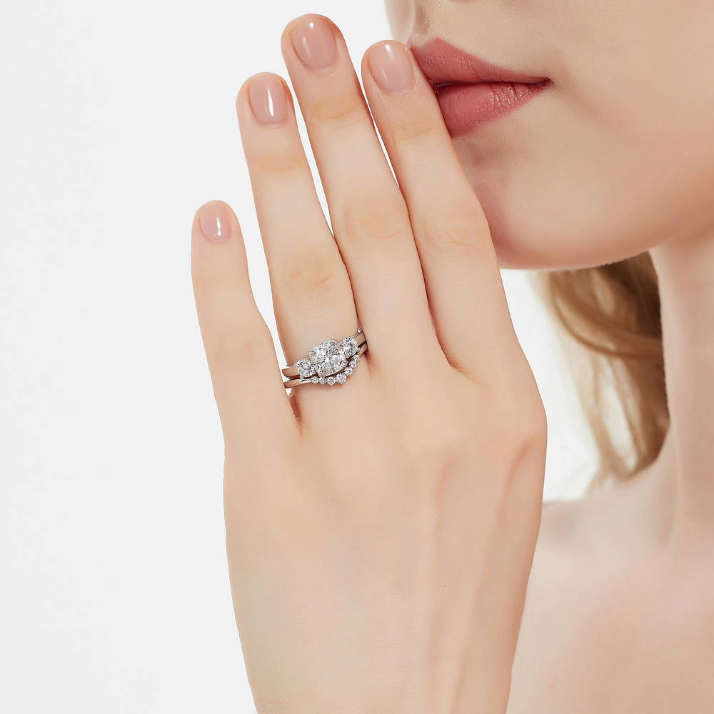 Model wearing 3-Stone Wishbone 7-Stone Cushion CZ Ring Set in Sterling Silver, 2 of 20