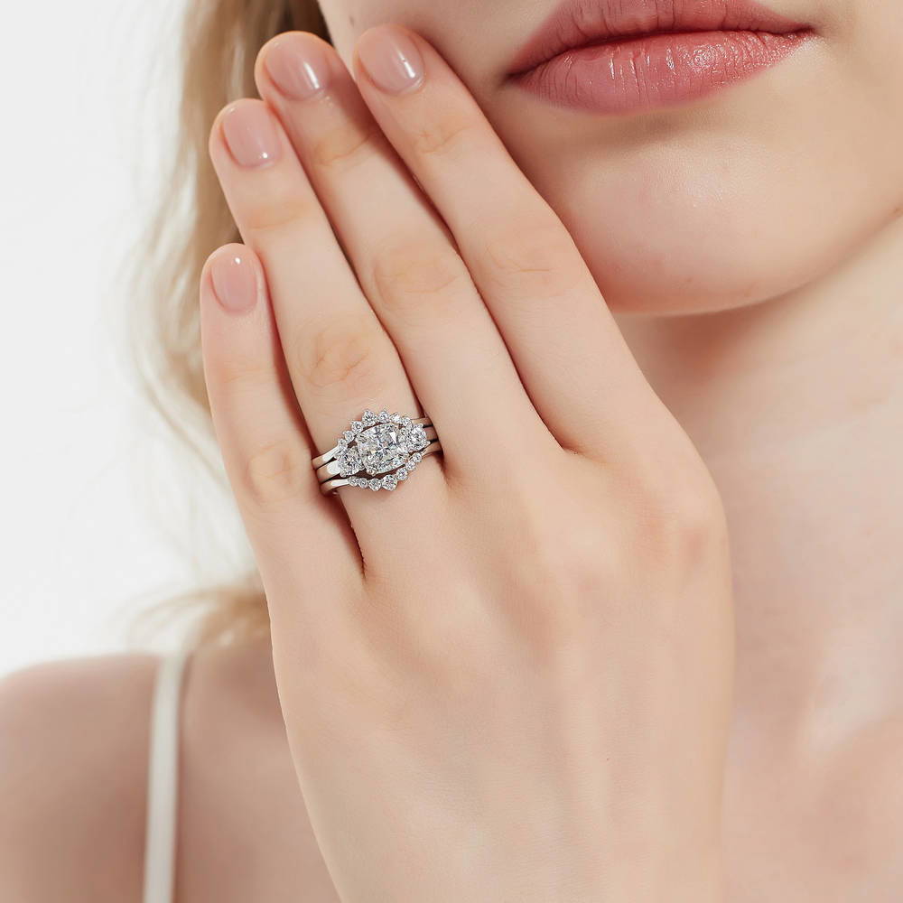 Model wearing 3-Stone Wishbone 7-Stone Cushion CZ Ring Set in Sterling Silver, 2 of 20