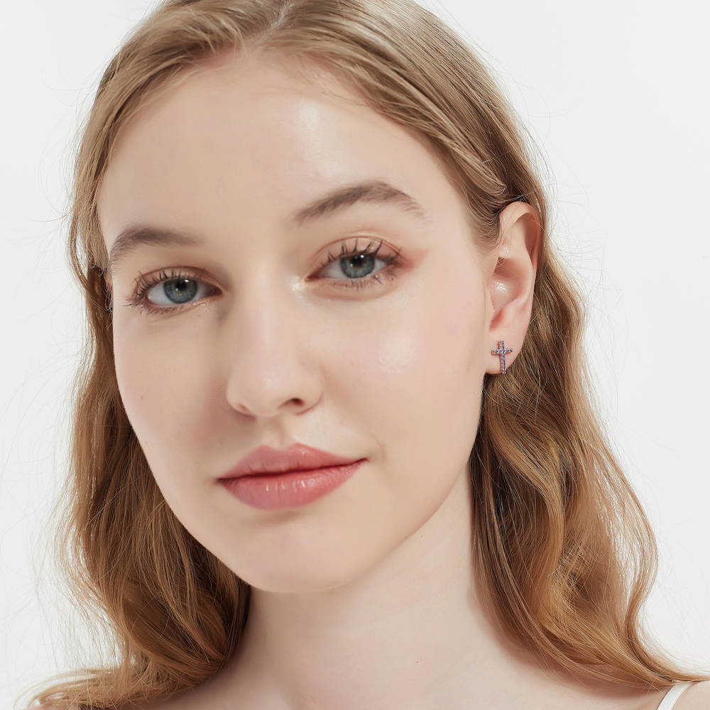 Model wearing Cross CZ Stud Earrings in Sterling Silver, 8 of 10