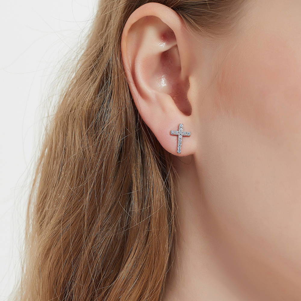 Model wearing Cross CZ Stud Earrings in Sterling Silver, 5 of 10