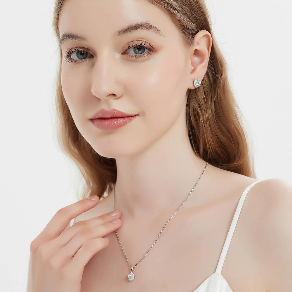 Model wearing Flower Halo CZ Necklace and Earrings Set in Sterling Silver, 2 of 15