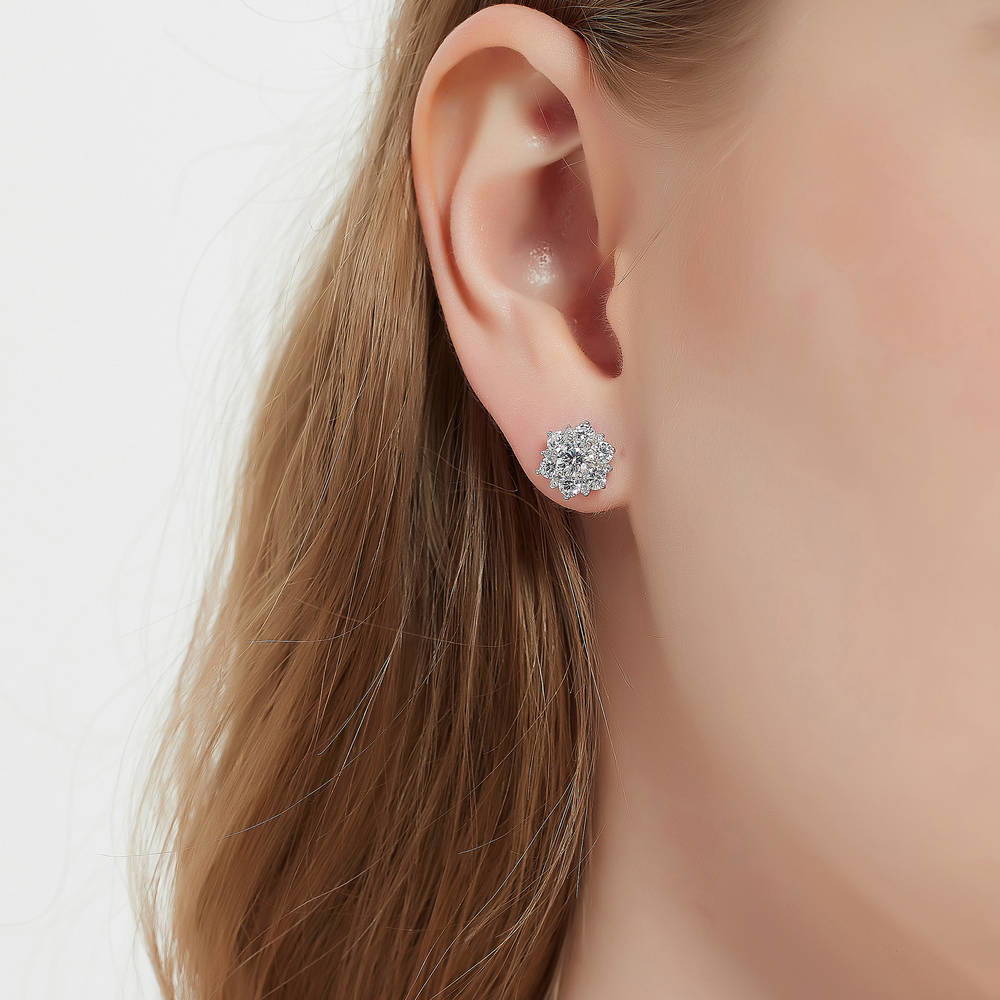 Model wearing Flower Halo CZ Stud Earrings in Sterling Silver, 2 of 10