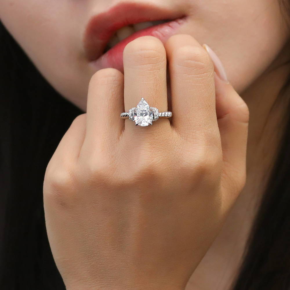 Model wearing Woven Solitaire CZ Ring in Sterling Silver